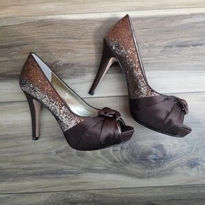 Antonio Melani women's bronze glitter peep-toe pumps with a satin bow